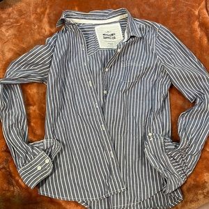 Blue and white striped button up